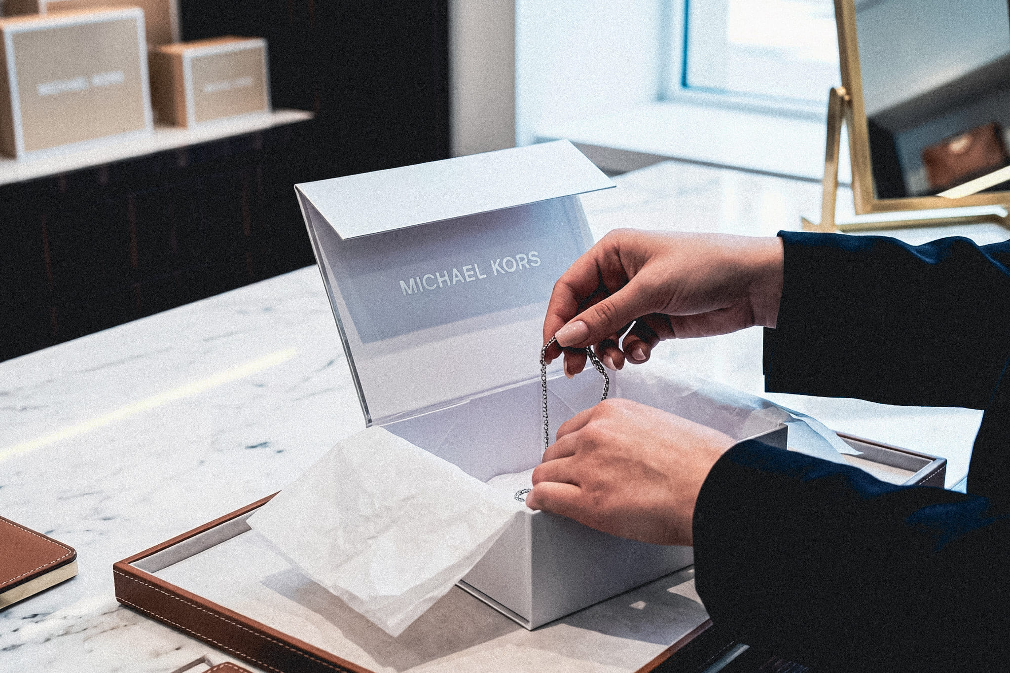 3rujs8fuiadc-firefly-gemini-flash-create-a-full-colour-luxury-retail-photograph-set-in-the-back-office-of-a-premium-mic-84445-1